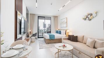 Luxury Studio, Balcony, City View | Iron/ironing board, cots/infant beds, free WiFi, bed sheets