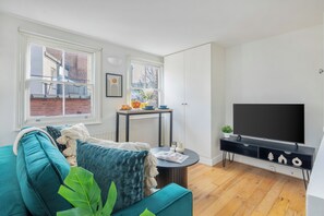 Appartement Ville, plusieurs lits, non-fumeur, vue ville | Coin séjour