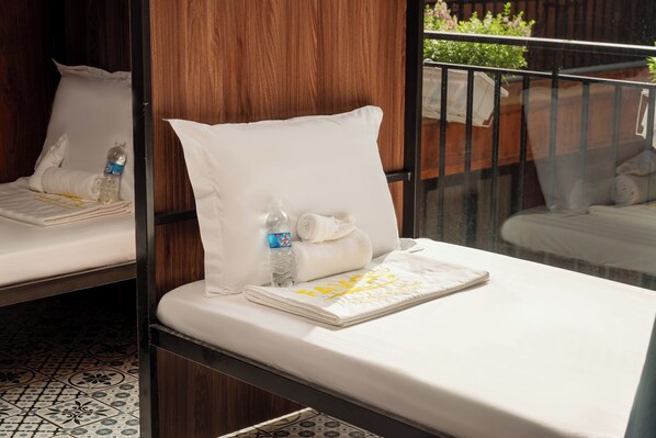 Premium bedding, down duvets, desk, laptop workspace