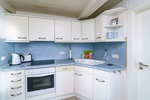 Réfrigérateur, four, plaque de cuisson, lave-vaisselle