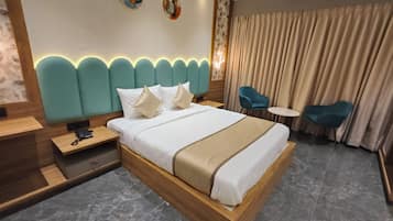 Deluxe Room, Balcony, City View | Desk, laptop workspace, free WiFi