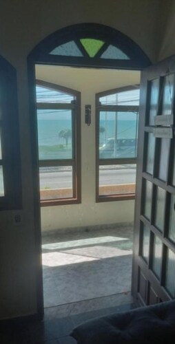 Fully furnished beachfront apartment with ocean views.