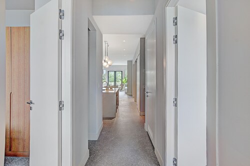 Spacious 3-bedroom condo in gated community near beach, with gym + pool