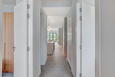 Spacious 3-bedroom condo in gated community near beach, with gym + pool