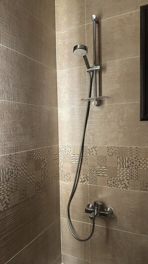 Shower, bidet, towels, soap - Hotel Apartment at Cairo Madinaty (Cairo Governorate)