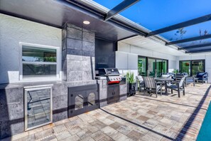 Outdoor dining - Venice 3BR Canal Home | Heated Pool, Near Braves (Venice)