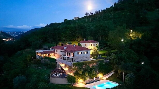 A large, multi-story house with a swimming pool, surrounded by lush greenery and hills. - Villa in the Douro - Quinta de Pias. Perfect for families! (Espadanedo)