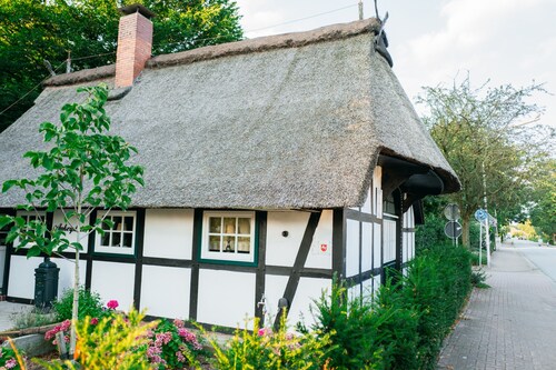 Ferienhaus 'Cottage am See mit Garten, Kamin, privater Terrasse & WLAN'