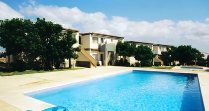 Peaceful Apartment with Shared Pool, Private Terrace and Wi-Fi Near the Cove