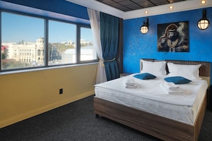Apartment, 1 Bedroom | Blackout drapes, soundproofing, iron/ironing board, free WiFi