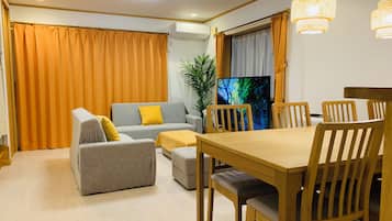 House, 4 Bedrooms, Kitchen, City View | Living area | 60-inch LCD TV with digital channels, computer monitors