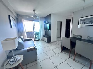 Appartement Confort | Coin séjour | Télévision