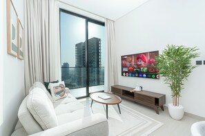 Exclusive Apartment, City View | Living room - PVH - Serene 1BR - Binghatti House (Dubai)