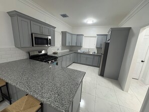 Microwave, oven, stovetop - BRAND NEW Austin Estates #1 1bed/1bath Apartment (Nassau)