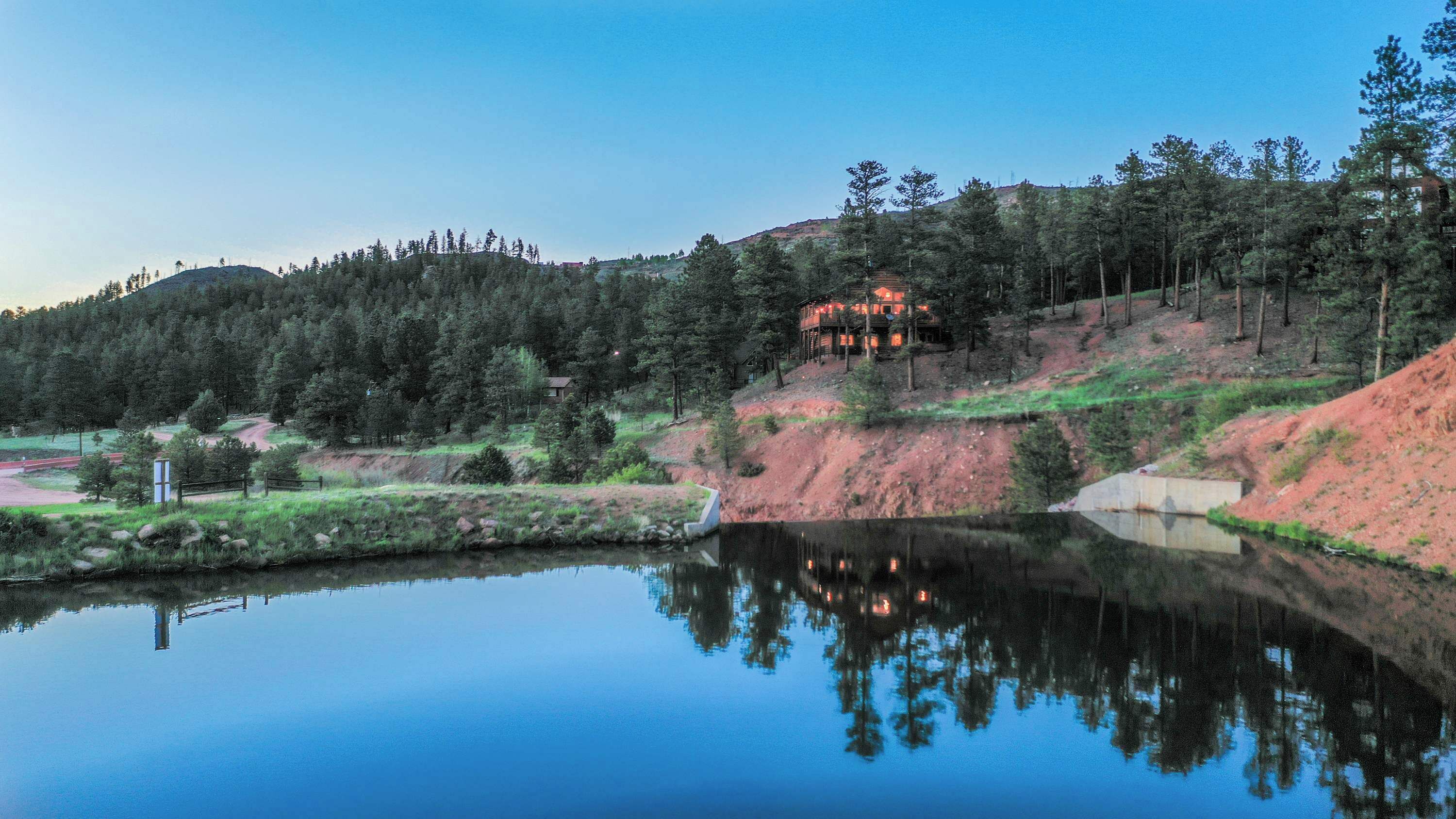 Westcreek Lakes community. Cabin sits just above the lake with long views and open skies.