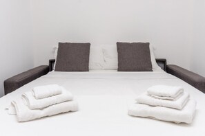 1 غرفة نوم ومكواة/لوح كي وواي فاي مجانًا وملاءات أسرّة