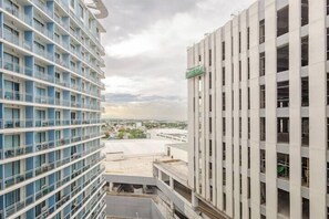 Executive Apartment, Balcony, City View | City view - Dessa'sCrib Apartment by Azure 1BR (Parañaque)