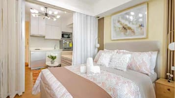 Apartemen Eksekutif, balkon, pemandangan kota | Brankas, tirai kedap cahaya, setrika/meja setrika, dan Wi-Fi gratis