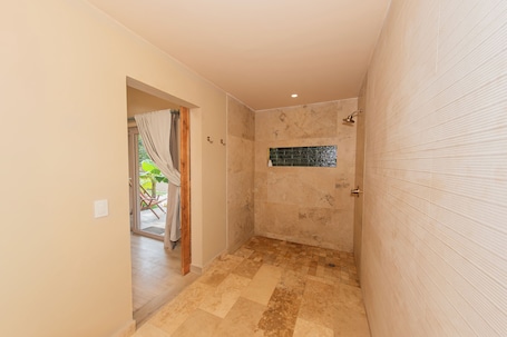 Junior Studio Suite, Pool View | Bathroom | Shower, towels, soap, shampoo