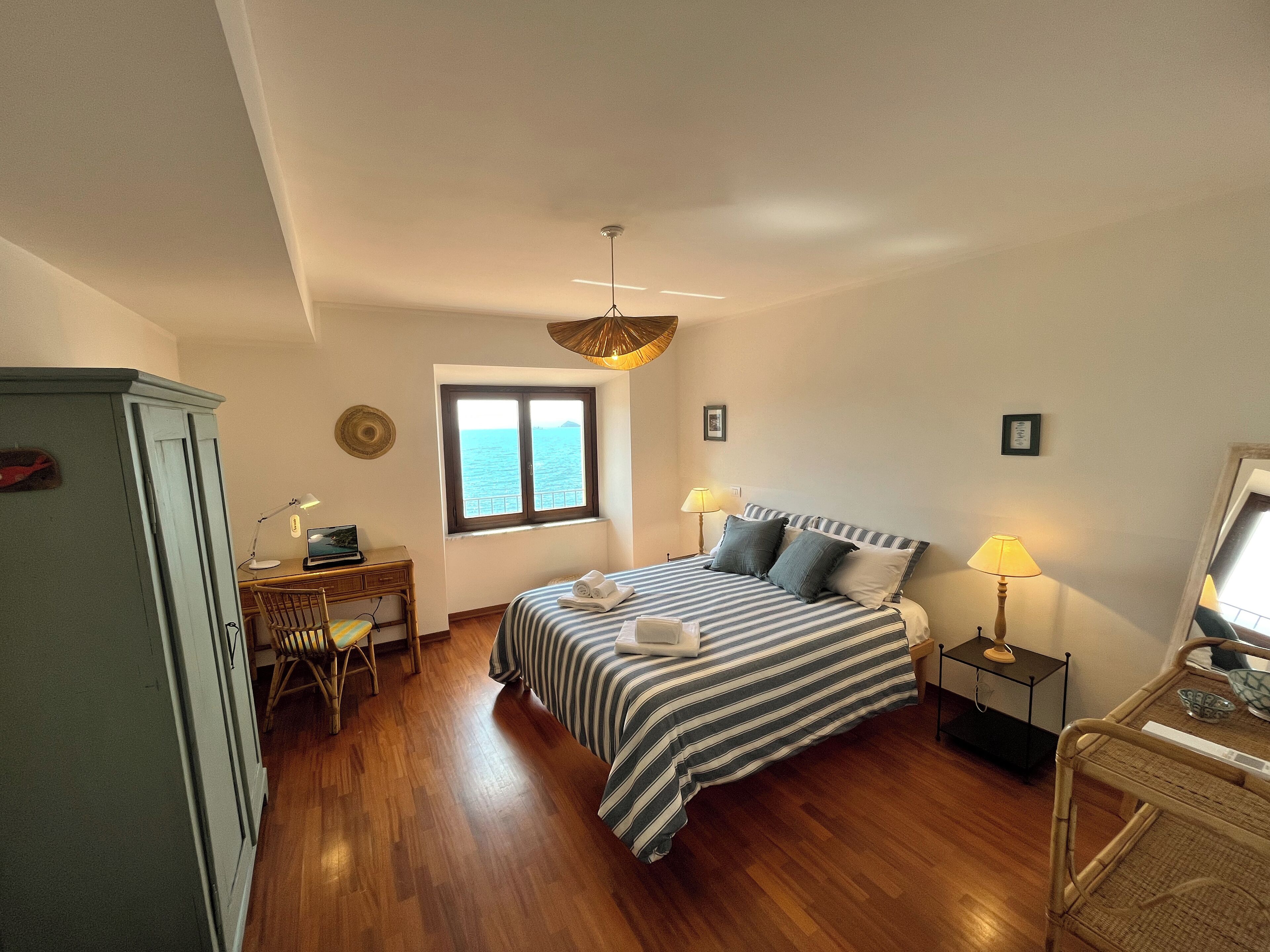 1 bedroom, desk, iron/ironing board, travel crib