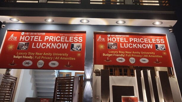A multi-story hotel with illuminated signage advertising "Hotel Priceless Lucknow." - HOTEL PRICELESS AMITY UNIVERSITY LUCKNOW (Lucknow)