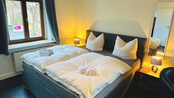 Economy Twin Room, Garden View | Desk, laptop workspace, free WiFi