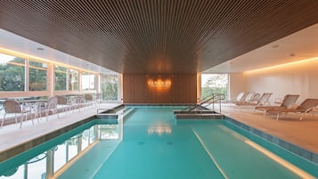 Indoor pool, open 9:00 AM to 11:00 PM, pool umbrellas, sun loungers