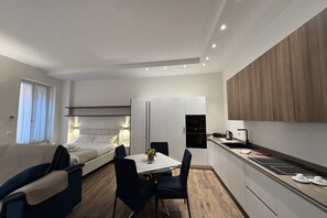 1 chambre, coffres-forts dans les chambres, fer et planche à repasser