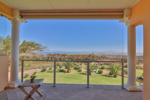 Suíte executiva, vista para o mar | Terraço/pátio