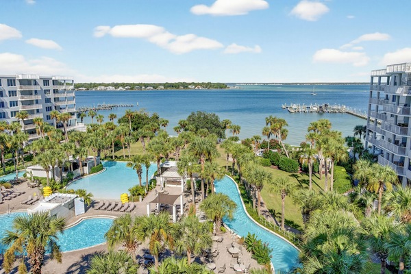 Stunning views from our roof top patio of the lazy river, pools, and bay.