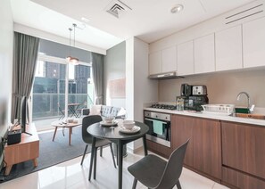 Fridge, microwave, oven, stovetop - Free housekeeping visits during your stay - StayShort - 1 Bed in Business Bay Sleeps 2 with Burj Views! (Business Bay)
