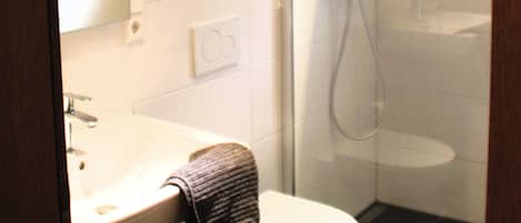 Shower, free toiletries, hair dryer, towels