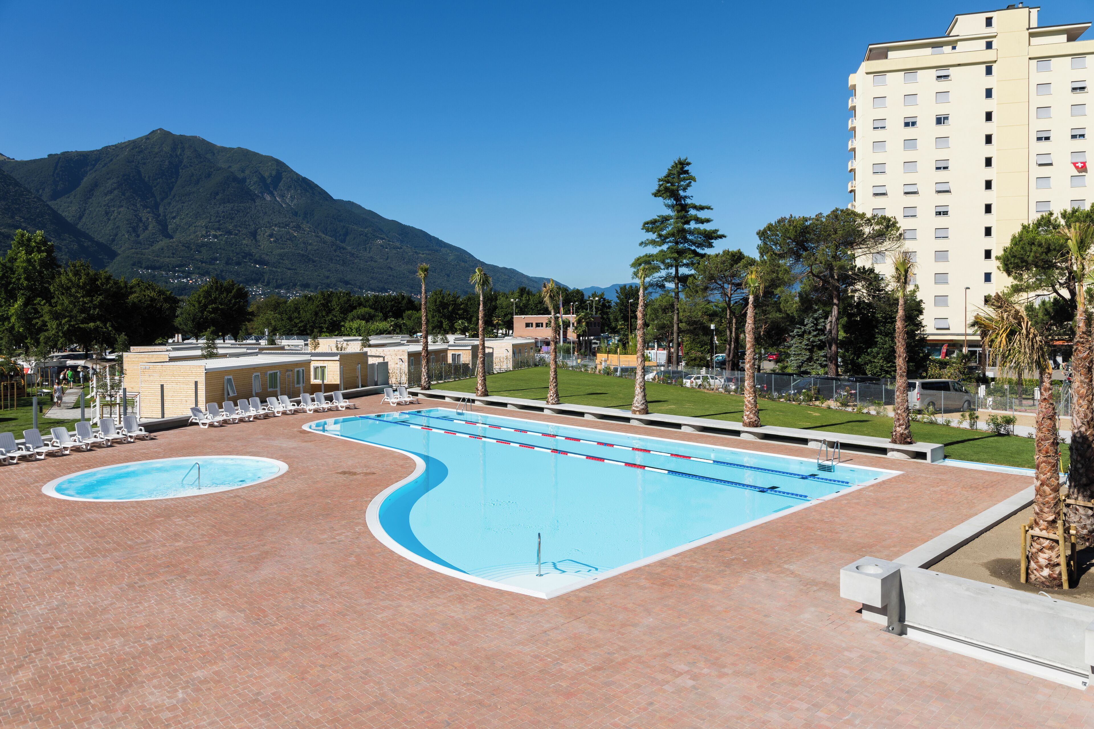 Seasonal outdoor pool, pool umbrellas, pool loungers