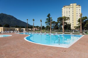 Seasonal outdoor pool, pool umbrellas, sun loungers