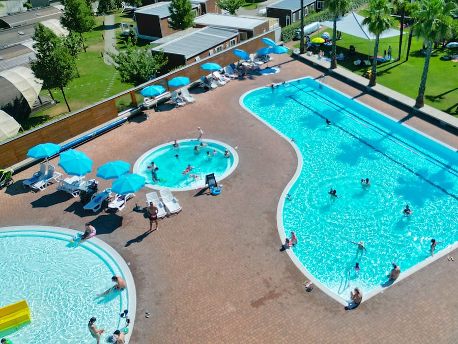 Seasonal outdoor pool, pool umbrellas, pool loungers