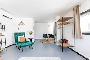 Apartamento, vista para o jardim | Área de estar