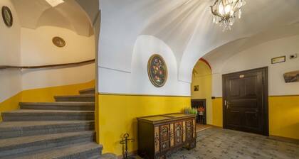 A cozy 65 square meters apartment, perfect for eight people, located on the first floor of a historic building built in 1864 and renovated in 2025 while maintaining its historic atmosphere (NO elevator).The property is located on Tarvisio's main street,