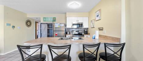 Apartamento, varias camas (Tradewinds 1106 - Austin Family Retre) | Cocina privada | Horno y tostadora