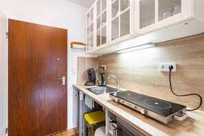 Kylskåp, ugn, spishäll och diskmaskin