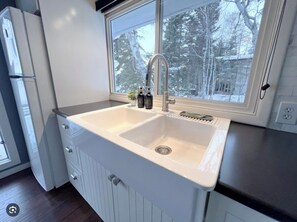 Shower, towels, soap, toilet paper