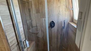Hair dryer, bidet, towels, soap