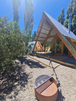 Cabana superior, vistes al jardí | Terrassa o pati