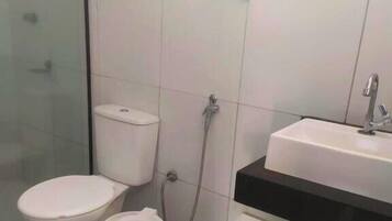 Shower, towels, toilet paper