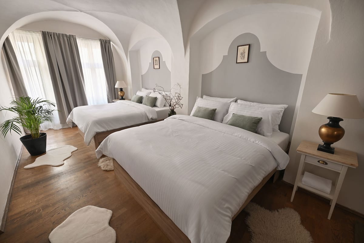 Deluxe Quadruple Room | Iron/ironing board, free WiFi, bed sheets