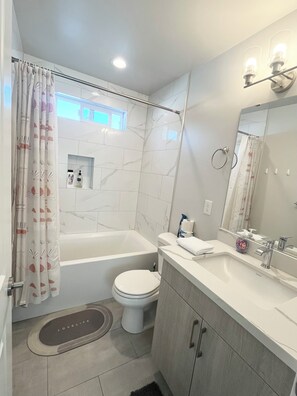 Hair dryer, towels, soap, toilet paper