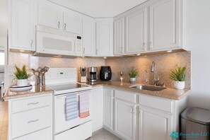 Fridge, microwave, oven, stovetop - 7th Fl Aloha Lani  | Lanai | AC | Parking | Pool (Honolulu)