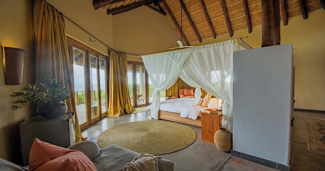 Suite – executive, balkong, strandutsikt | Skrivebord, skrivebord for bærbar PC og strykejern/-brett