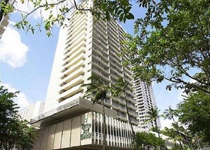 A high-rise building with multiple balconies and a modern architectural design. - 4th Fl Marine Surf Studio | Corner Unit | Parking (Honolulu)