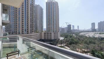 Luxury Apartment, Balcony, City View | In-room dining