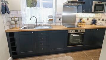 Rentaplats i utensilis de cuina, vaixella i coberteria